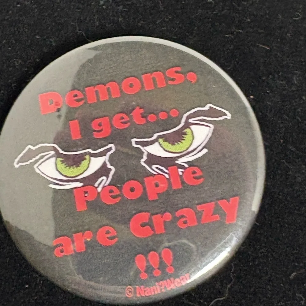 Black Button with Demon Eyes “Demons I Get, But People Are Crazy”